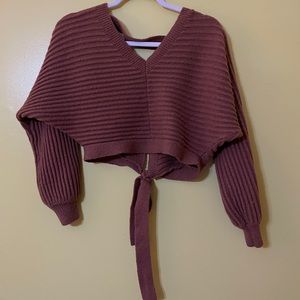 worn 4 times . Very cute top!